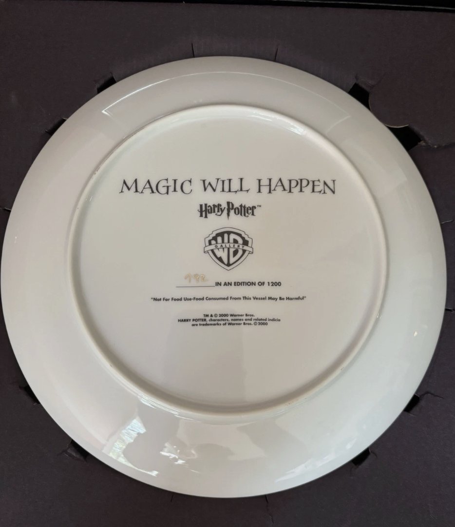 Warner Bros. Gallery “Magic Will Happen” Harry Potter holiday plate, back, reading “TM & © 2000 Warner Bros.”