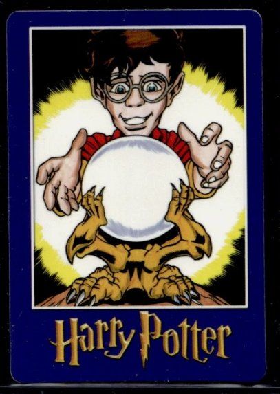 Harry Potter “Magic Will Happen” vending card: Harry reaching for a glowing sphere held in golden claws