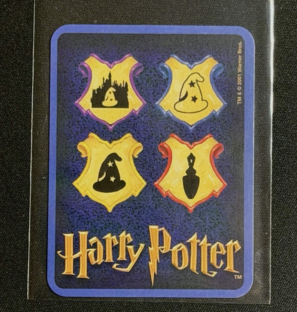 UK/European “Philosopher’s Stone” Mystery at Hogwarts character card, back, showing TM and copyright 2001 Warner Bros mark